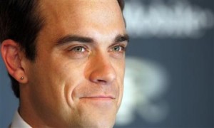 Robbie Robbie Williams confiesa sus deseos por Mila Kunis